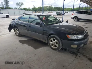 1998 Lexus ES 300 z VIN JT8BF28G7W5048920, wystawiony jako Copart lot #56391015 z przebiegiem 234 109 mil mil oraz Nie do naprawy • Non repairable. Historia ofert i sprzedaży dostępna na DreamBid. Obrazek 4.
