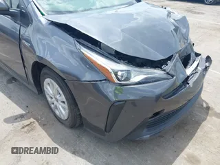 2021 Toyota Prius L Eco z VIN JTDKAMFU3M3152785, wystawiony jako IAAI lot #42501351 z przebiegiem 60 489 mil mil oraz . Historia ofert i sprzedaży dostępna na DreamBid. Obrazek 18.