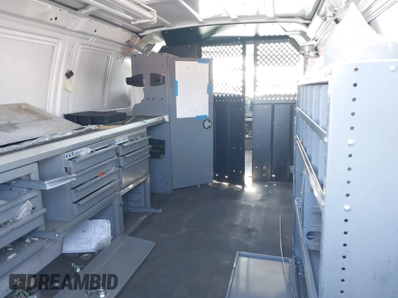 2003 Ford Econoline Cargo with VIN 1FTNE24L23HB81499, listed as a IAAI auction lot 41944485 with 86,629 mi miles and . Bid and sale history available at DreamBid. Image 8.