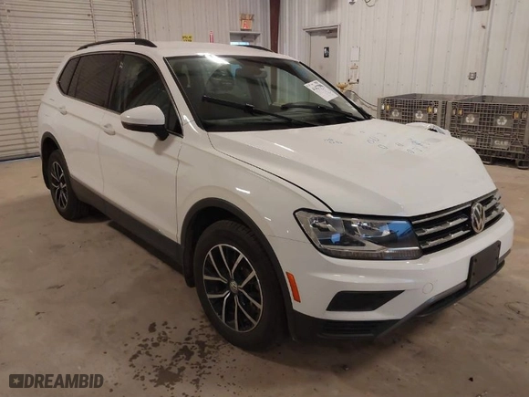 2021 Volkswagen Tiguan SE with VIN 3VV3B7AX3MM136073, listed as a IAAI auction lot 41427198 with 58,164 mi miles. Bid and sale history available at carsss.com. Image 1.