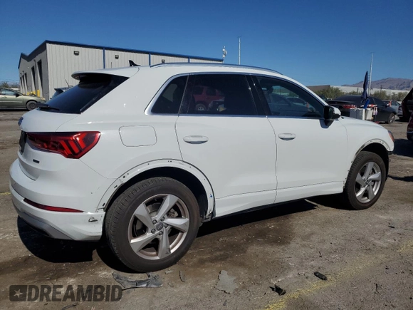 2020 Audi Q3 Premium with VIN WA1AECF30L1023652, listed as a Copart auction lot 57148915 with 69,621 mi miles and Salvage title. Bid and sale history available at DreamBid. Image 3.