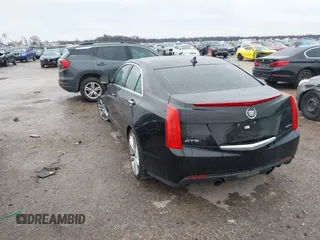 2014 Cadillac ATS Standard RWD with VIN 1G6AA5RX5E0104427, listed as a IAAI auction lot 41542467 with 83,351 mi miles and . Bid and sale history available at DreamBid. Image 3.