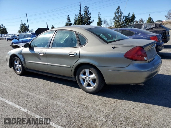 2001 Ford Taurus LX Standard z VIN 1FAFP52U51A138332, wystawiony jako Copart lot #88528355 z przebiegiem 166 511 mil mil oraz Szkoda całkowita • Salvage title. Historia ofert i sprzedaży dostępna na DreamBid. Obrazek 2.