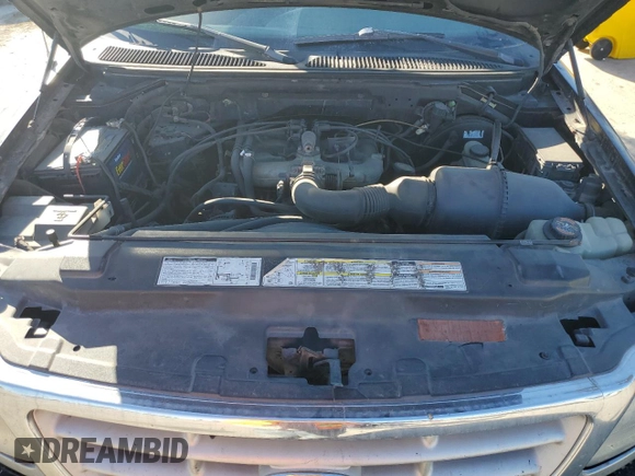 1999 Ford F-150 с VIN 2FTZX1729XCA25031, выставлен на аукционе Copart как лот 46941615 с пробегом 310 800 миль миль и Списание • Salvage title. История ставок и продаж доступна на DreamBid. Изображение 11.
