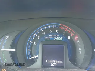 2012 Honda Insight LX with VIN JHMZE2H58CS001411, listed as a IAAI auction lot 42148575 with 155,586 mi miles and . Bid and sale history available at DreamBid. Image 7.
