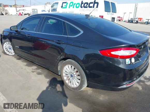 2013 Ford Fusion SE Hybrid with VIN 3FA6P0LU4DR325699, listed as a IAAI auction lot 41677237 with 129,004 mi miles. Bid and sale history available at carsss.com. Image 3.