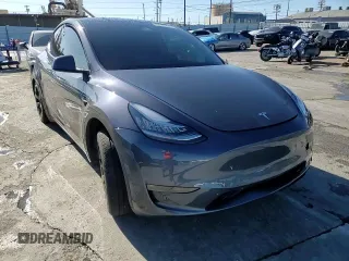 2023 Tesla Model Y Long Range with VIN 7SAYGDEE2PA047794, listed as a Copart auction lot 48397305 with 18,850 mi miles and Salvage Title. Bid and sale history available at DreamBid. Image 12.
