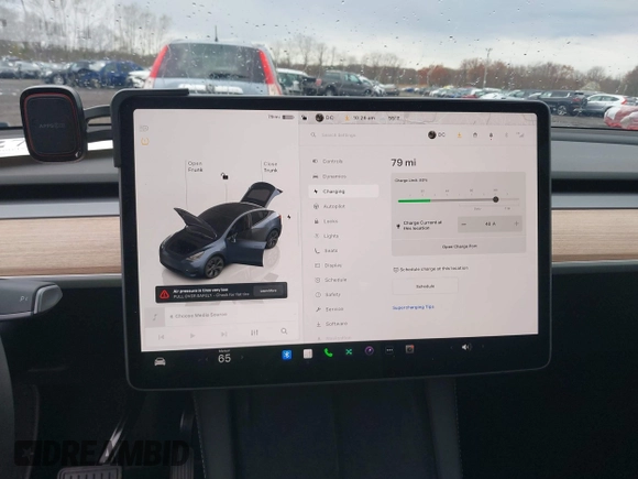 2024 Tesla Model Y Long Range z VIN 7SAYGDEE1RA323921, wystawiony jako IAAI lot #42027195 z przebiegiem 13 774 mil mil oraz . Historia ofert i sprzedaży dostępna na DreamBid. Obrazek 17.