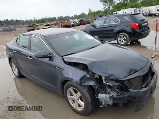 2015 Kia Optima LX z VIN KNAGM4A77F5535650, wystawiony jako IAAI lot #42606669 z przebiegiem 143 224 mil mil oraz . Historia ofert i sprzedaży dostępna na DreamBid. Obrazek 1.