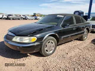 2001 Lincoln Continental with VIN 1LNHM97V61Y604213, listed as a Copart auction lot 52517535 with 112,391 mi miles and Salvage Title. Bid and sale history available at carsss.com. Image 1.