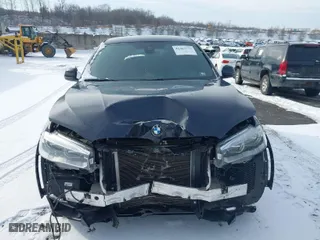 2015 BMW X6 xDrive50i with VIN 5UXKU6C54F0F94383, listed as a IAAI auction lot 41467773 with 114,560 mi miles. Bid and sale history available at carsss.com. Image 12.
