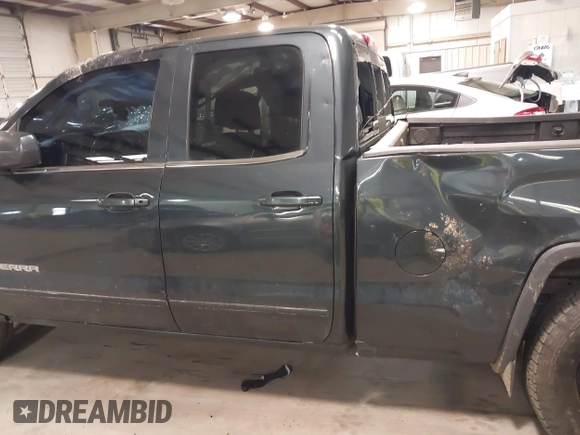 2017 GMC Sierra 1500 SLE z VIN 1GTV2MEC2HZ194077, wystawiony jako IAAI lot #41509400 z przebiegiem Nie podano mil oraz . Historia ofert i sprzedaży dostępna na DreamBid. Obrazek 14.