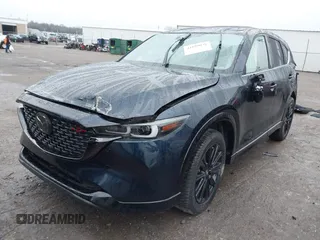 2022 Mazda CX-5 2.5 Turbo with VIN JM3KFBAY8N0635618, listed as a IAAI auction lot 41199038 with Not Provided miles and . Bid and sale history available at carsss.com. Image 17.
