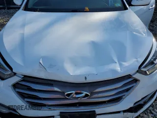 2017 Hyundai Santa Fe 2.0T z VIN 5XYZUDLA3HG397569, wystawiony jako Copart lot #77360944 z przebiegiem 145 512 mil mil oraz Szkoda całkowita • Salvage title. Historia ofert i sprzedaży dostępna na DreamBid. Obrazek 13.