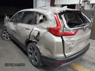 2018 Honda CR-V EX-L z VIN 2HKRW2H89JH671327, wystawiony jako IAAI lot #42159441 z przebiegiem Nie podano mil oraz . Historia ofert i sprzedaży dostępna na DreamBid. Obrazek 3.