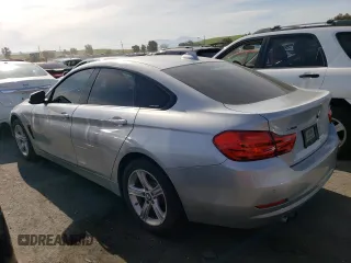 2015 BMW 4 Series 428i xDrive with VIN WBA4C9C52FG135501, listed as a Copart auction lot 51219774 with 104,333 mi miles and Salvage Title. Bid and sale history available at DreamBid. Image 2.