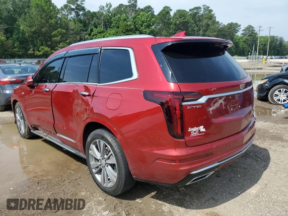 2022 Cadillac XT6 Premium Luxury with VIN 1GYKPCRS7NZ101706, listed as a Copart auction lot 63389985 with 27,021 mi miles and Salvage title. Bid and sale history available at DreamBid. Image 2.