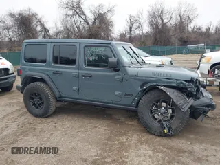 2024 Jeep Wrangler Sport S with VIN 1C4PJXDG7RW263740, listed as a IAAI auction lot 41551988 with 5,122 mi miles and . Bid and sale history available at DreamBid. Image 13.