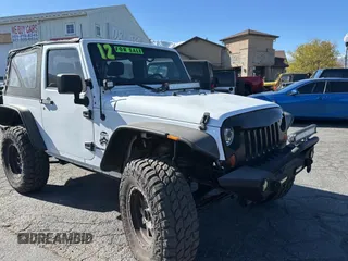 2012 Jeep Wrangler Sport with VIN 1C4GJWAG5CL201499, listed as a Copart auction lot 55247615 with 116,414 mi miles and Clean Title. Bid and sale history available at carsss.com. Image 1.