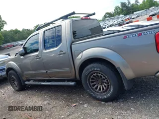 2005 Nissan Frontier LE with VIN 1N6AD07UX5C447844, listed as a IAAI auction lot 42184393 with 202,226 mi miles and . Bid and sale history available at DreamBid. Image 14.