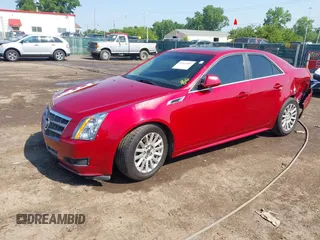 2011 Cadillac CTS Luxury with VIN 1G6DG5EY9B0146136, listed as a IAAI auction lot 42463083 with 182,324 mi miles and . Bid and sale history available at DreamBid. Image 2.