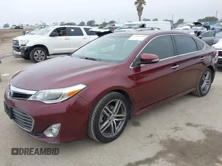 2013 Toyota Avalon XLE with VIN 4T1BK1EB1DU001297, listed as a IAAI auction lot 42041699 with 217,190 mi miles and . Bid and sale history available at DreamBid. Image 2.
