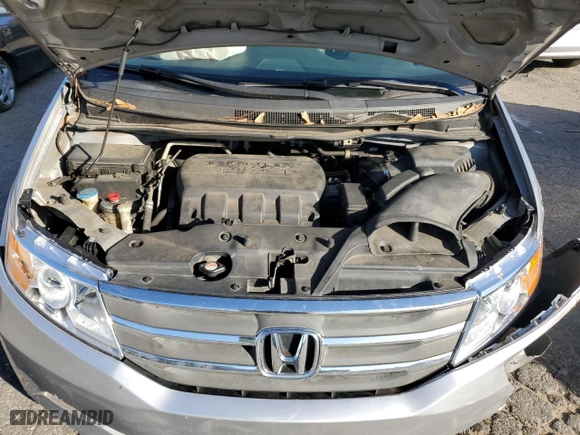 2012 Honda Odyssey LX with VIN 5FNRL5H26CB019627, listed as a Copart auction lot 87094684 with 214,563 mi miles and Salvage Title. Bid and sale history available at carsss.com. Image 12.