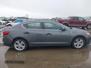 2014 Acura ILX Hybrid Technology z VIN 19VDE3F75EE300312, wystawiony jako IAAI lot #41608572 z przebiegiem 126 974 mil mil oraz . Historia ofert i sprzedaży dostępna na DreamBid. Obrazek 13.