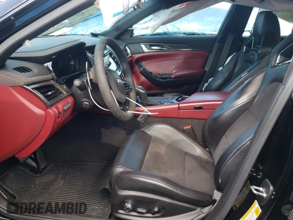 2018 Cadillac CTS-V z VIN 1G6A15S64J0157874, wystawiony jako Copart lot #70587854 z przebiegiem 40 802 mil mil oraz Szkody całkowita. Historia ofert i sprzedaży dostępna na DreamBid. Obrazek 7.