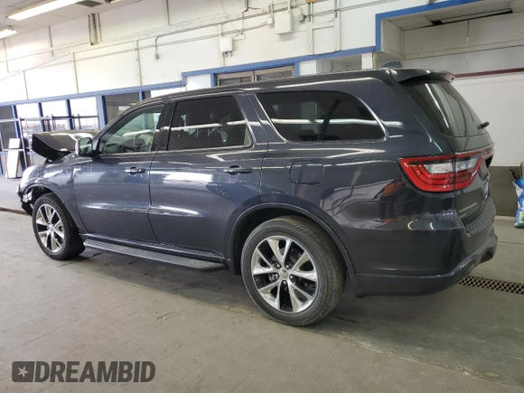 2015 Dodge Durango R/T with VIN 1C4SDJCT8FC772312, listed as a Copart auction lot 56235075 with 61,813 mi miles and Salvage title. Bid and sale history available at DreamBid. Image 2.