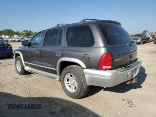 2003 Dodge Durango SLT Plus z VIN 1D4HS58NX3F518678, wystawiony jako Copart lot #56075525 z przebiegiem 140 709 mil mil oraz Szkody całkowita. Historia ofert i sprzedaży dostępna na DreamBid. Obrazek 2.