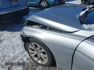 2015 BMW 3 Series 328i xDrive with VIN WBA3B5G5XFNS20065, listed as a IAAI auction lot 41590092 with 119,242 mi miles. Bid and sale history available at carsss.com. Image 6.