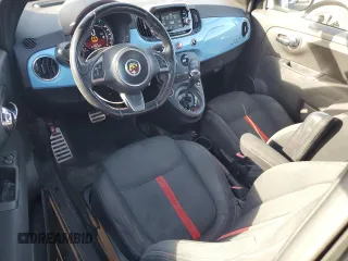 2017 FIAT 500 Abarth z VIN 3C3CFFFH9HT506053, wystawiony jako Copart lot #81367564 z przebiegiem 91 516 mil mil oraz Szkody całkowita. Historia ofert i sprzedaży dostępna na DreamBid. Obrazek 8.