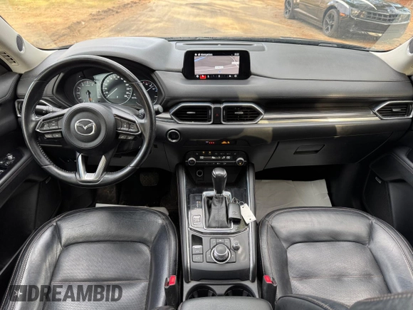 2020 Mazda CX-5 Grand Touring with VIN JM3KFADM8L0785373, listed as a Copart auction lot 50829175 with 135,736 mi miles and Clean Title. Bid and sale history available at DreamBid. Image 9.