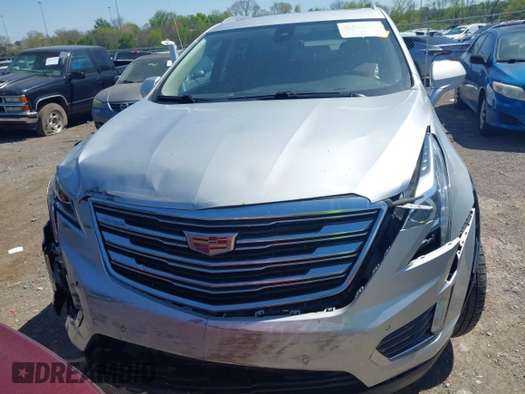 2017 Cadillac XT5 Luxury FWD z VIN 1GYKNBRS6HZ231609, wystawiony jako IAAI lot #42043791 z przebiegiem 106 594 mil mil oraz . Historia ofert i sprzedaży dostępna na DreamBid. Obrazek 12.
