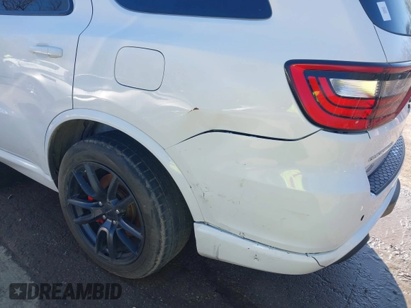 2018 Dodge Durango SRT with VIN 1C4SDJGJXJC395094, listed as a IAAI auction lot 41857351 with 90,106 mi miles and . Bid and sale history available at DreamBid. Image 6.