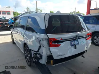2021 Honda Odyssey Touring z VIN 5FNRL6H80MB003323, wystawiony jako IAAI lot #42303968 z przebiegiem 51 531 mil mil oraz . Historia ofert i sprzedaży dostępna na DreamBid. Obrazek 3.