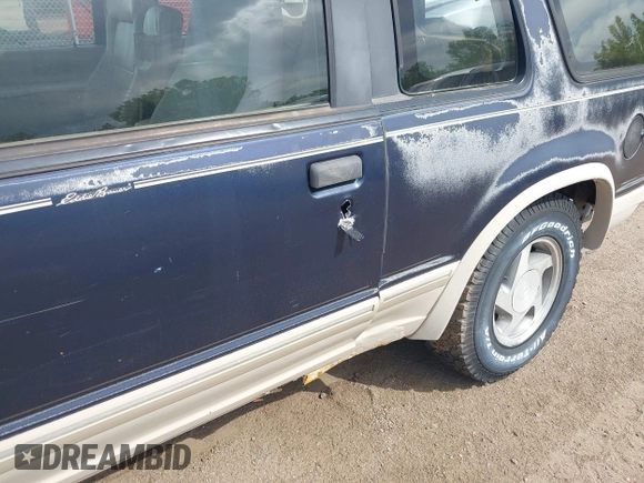 1991 Ford Explorer z VIN 1FMCU24X0MUA91155, wystawiony jako IAAI lot #42314856 z przebiegiem 75 836 mil mil oraz . Historia ofert i sprzedaży dostępna na DreamBid. Obrazek 6.