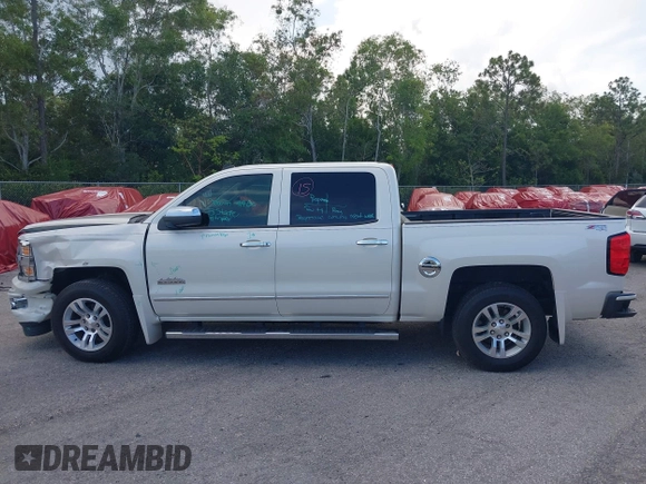 2014 Chevrolet Silverado 1500 High Country with VIN 3GCUKTEC4EG401571, listed as a IAAI auction lot 41984349 with 104,221 mi miles and . Bid and sale history available at DreamBid. Image 14.