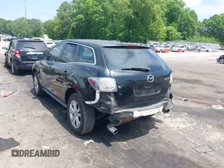 2010 Mazda CX-7 Touring z VIN JM3ER2W30A0341657, wystawiony jako IAAI lot #42123453 z przebiegiem 173 135 mil mil oraz . Historia ofert i sprzedaży dostępna na DreamBid. Obrazek 3.