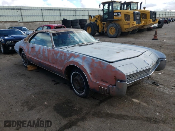 1967 Oldsmobile Toronado with VIN 396877N610043, listed as a Copart auction lot 79516854 with 242,595 mi miles and Clean Title. Bid and sale history available at DreamBid. Image 4.