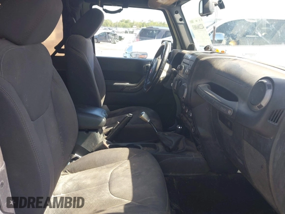 2014 Jeep Wrangler Sport with VIN 1C4AJWAG0EL126459, listed as a IAAI auction lot 42286803 with 179,025 mi miles and . Bid and sale history available at DreamBid. Image 5.