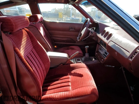 1982 Datsun 280ZX z VIN JN1HZ04S9CX450233, wystawiony jako Copart lot #88735675 z przebiegiem 137 235 mil mil oraz Tytuł czysty. Historia ofert i sprzedaży dostępna na DreamBid. Obrazek 10.