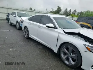 2018 Honda Accord Touring z VIN 1HGCV2F9XJA042690, wystawiony jako Copart lot #57122025 z przebiegiem 55 364 mil mil oraz Szkoda całkowita • Salvage title. Historia ofert i sprzedaży dostępna na DreamBid. Obrazek 14.