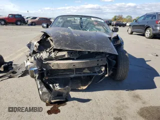 2000 Toyota MR2 z VIN JTDFR320XY0020489, wystawiony jako Copart lot #75920154 z przebiegiem Nie podano mil oraz Szkody całkowita. Historia ofert i sprzedaży dostępna na DreamBid. Obrazek 5.