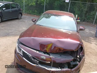 2018 Kia Optima LX with VIN 5XXGT4L36JG185545, listed as a IAAI auction lot 42434301 with 118,303 mi miles and . Bid and sale history available at DreamBid. Image 12.
