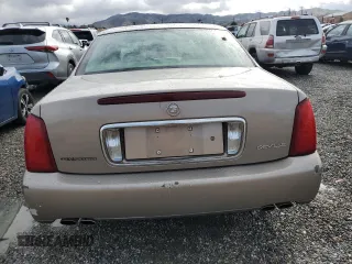 2001 Cadillac DeVille z VIN 1G6KD54Y61U248616, wystawiony jako Copart lot #47057095 z przebiegiem 110 009 mil mil oraz Czysty tytuł • Clean title. Historia ofert i sprzedaży dostępna na DreamBid. Obrazek 6.