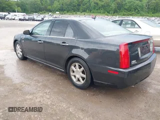 2008 Cadillac STS RWD with VIN 1G6DK67V980165768, listed as a IAAI auction lot 42185454 with 214,813 mi miles and . Bid and sale history available at DreamBid. Image 3.