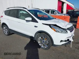 2014 Ford Escape SE z VIN 1FMCU9G96EUD57432, wystawiony jako IAAI lot #41681910 z przebiegiem 82 013 mil mil oraz . Historia ofert i sprzedaży dostępna na DreamBid. Obrazek 1.
