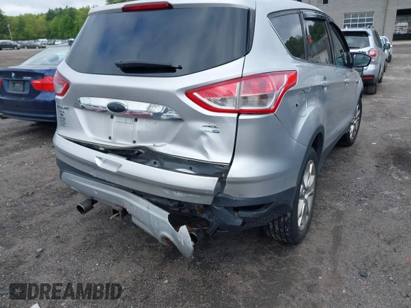 2013 Ford Escape SEL с VIN 1FMCU9H97DUC06371, выставлен на аукционе IAAI как лот 42255108 с пробегом 158 024 миль миль и . История ставок и продаж доступна на DreamBid. Изображение 6.